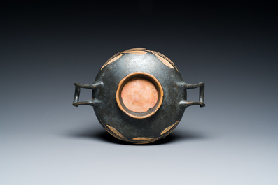 A Greek kylix with a swan and a skyphos with an owl, Apulia, Italy, ca. 4th C. b.C