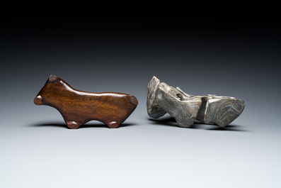 A Chinese grey lingbi stone scholar's rock on wooden stand, 19/20th C.