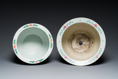 Three Chinese blue and white, famille rose and famille verte fish bowls and jardini&egrave;res, 19th C.