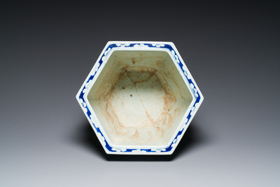 Three Chinese blue and white, famille rose and famille verte fish bowls and jardini&egrave;res, 19th C.