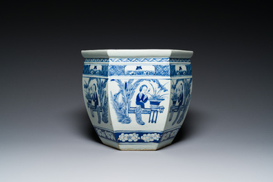 Three Chinese blue and white, famille rose and famille verte fish bowls and jardini&egrave;res, 19th C.