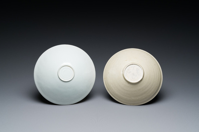 A Chinese qingbai-glazed 'phoenixes' bowl and a cream-glazed 'fish' bowl, probably Song