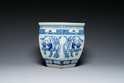 Three Chinese blue and white, famille rose and famille verte fish bowls and jardini&egrave;res, 19th C.