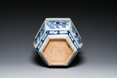 Three Chinese blue and white, famille rose and famille verte fish bowls and jardini&egrave;res, 19th C.