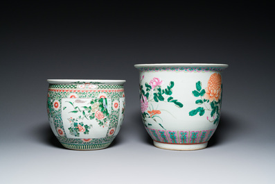 Three Chinese blue and white, famille rose and famille verte fish bowls and jardini&egrave;res, 19th C.