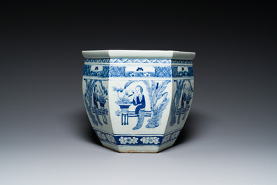 Three Chinese blue and white, famille rose and famille verte fish bowls and jardini&egrave;res, 19th C.