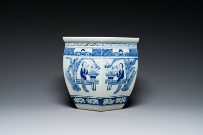 Three Chinese blue and white, famille rose and famille verte fish bowls and jardini&egrave;res, 19th C.