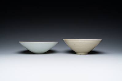 A Chinese qingbai-glazed 'phoenixes' bowl and a cream-glazed 'fish' bowl, probably Song