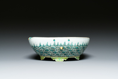 A Chinese famille verte 'waves' bowl, Daoguang seal mark, 19th C.