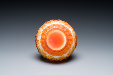 A Chinese overlay Beijing glass bottle vase with lotus scrolls in yellow on white, 19t/20h C.