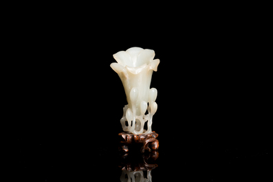 A Chinese white jade 'magnolia' carving, Qing