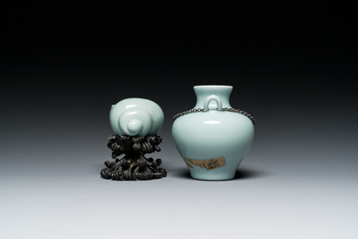 A Chinese celadon-glazed water pot on wooden stand and a small 'hu' vase, 19/20th C.
