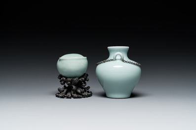 A Chinese celadon-glazed water pot on wooden stand and a small 'hu' vase, 19/20th C.