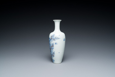 A Chinese blue, white and copper-red 'magpie and prunus' vase, Kangxi mark, 19/20th C.