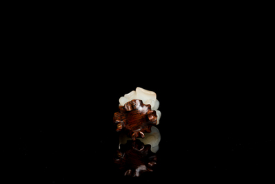 A Chinese white jade 'magnolia' carving, Qing
