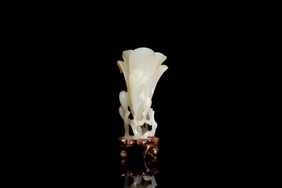 A Chinese white jade 'magnolia' carving, Qing