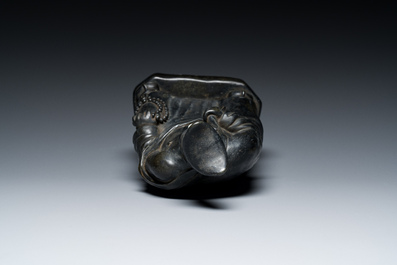 A Chinese monochrome black-glazed figure of Ji Gong, 18th C.