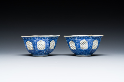 A pair of Chinese blue and white octagonal reticulated bowls, Transitional period