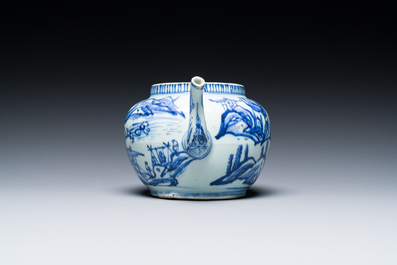 A Chinese blue and white teapot with a mountainous landscape, Transitional period
