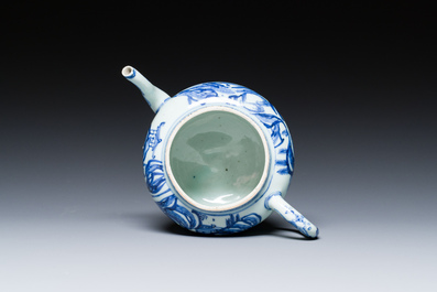 A Chinese blue and white teapot with a mountainous landscape, Transitional period