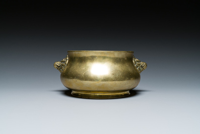 A Chinese bronze elephant-head-handled censer, Xuande mark, Kangxi/Qianlong