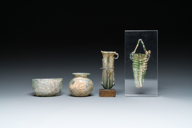Two Roman glass balsamariums, a flask and a bowl, 2nd/4th C.