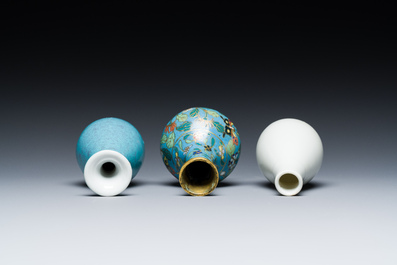 Three small Chinese bottle vases in cloisonn&eacute;, white and robin's-egg-glazed porcelain, 19/20th C.