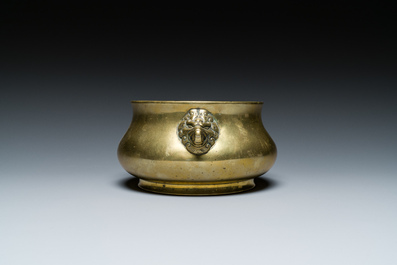 A Chinese bronze elephant-head-handled censer, Xuande mark, Kangxi/Qianlong