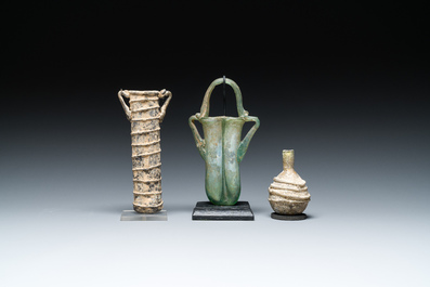 Two Roman glass balsamariums and a flask, 2nd/4th C.