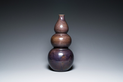 A large Chinese aubergine-glazed triple gourd vase, 18th C.