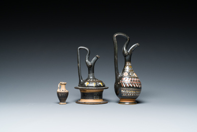 A polychrome Greek pottery 'oinochoe' ewer, an 'epichysis' ewer and a small vase, 5th/3rd C. b.C.