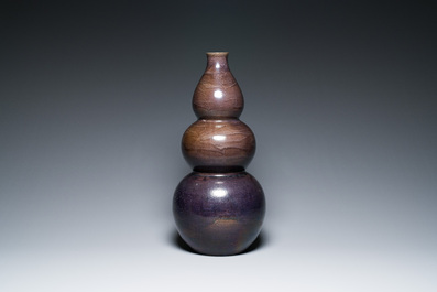 A large Chinese aubergine-glazed triple gourd vase, 18th C.