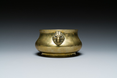 A Chinese bronze elephant-head-handled censer, Xuande mark, Kangxi/Qianlong