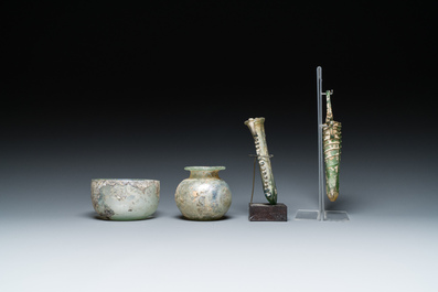 Two Roman glass balsamariums, a flask and a bowl, 2nd/4th C.