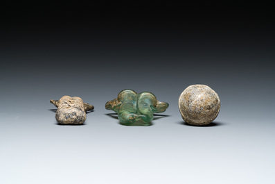 Two Roman glass balsamariums and a flask, 2nd/4th C.