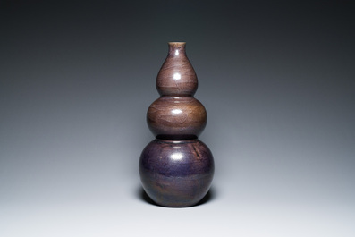 A large Chinese aubergine-glazed triple gourd vase, 18th C.