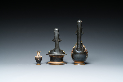 A polychrome Greek pottery 'oinochoe' ewer, an 'epichysis' ewer and a small vase, 5th/3rd C. b.C.