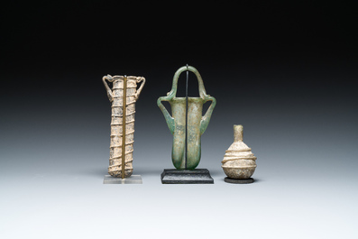 Two Roman glass balsamariums and a flask, 2nd/4th C.
