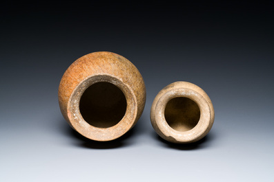 Two Chinese pottery storage or cooking vessels, 'Li', Neolithic period