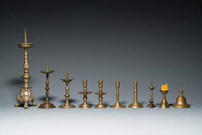 A varied collection of ten brass and bronze candlesticks, Western Europe, 15th C. and later