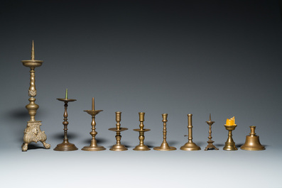 A varied collection of ten brass and bronze candlesticks, Western Europe, 15th C. and later