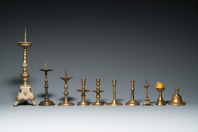 A varied collection of ten brass and bronze candlesticks, Western Europe, 15th C. and later