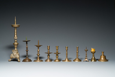 A varied collection of ten brass and bronze candlesticks, Western Europe, 15th C. and later