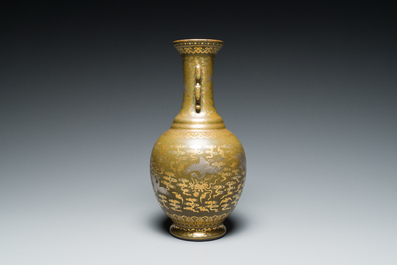 A Chinese gilt- and silver-decorated teadust-glazed vase with bats and cranes among clouds, Qianlong mark, Republic