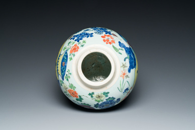 A Chinese wucai 'kylin and sage' jar, Zhao 朝 seal mark, Transitional period