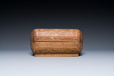 A Chinese rectangular huanghuali wooden box and cover with dragons, 17/18th C.