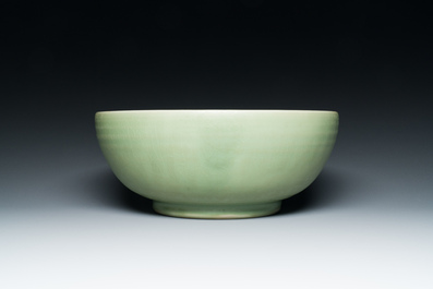 A Chinese Longquan celadon bowl with underglaze floral design, Ming