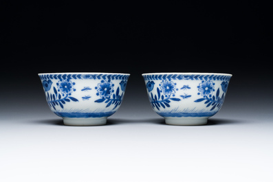 Nine Chinese blue and white 'Madonna and Child' saucers and two cups, Kangxi