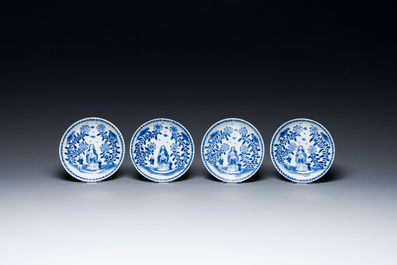 Nine Chinese blue and white 'Madonna and Child' saucers and two cups, Kangxi