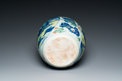 A Chinese wucai 'kylin and sage' jar, Zhao 朝 seal mark, Transitional period